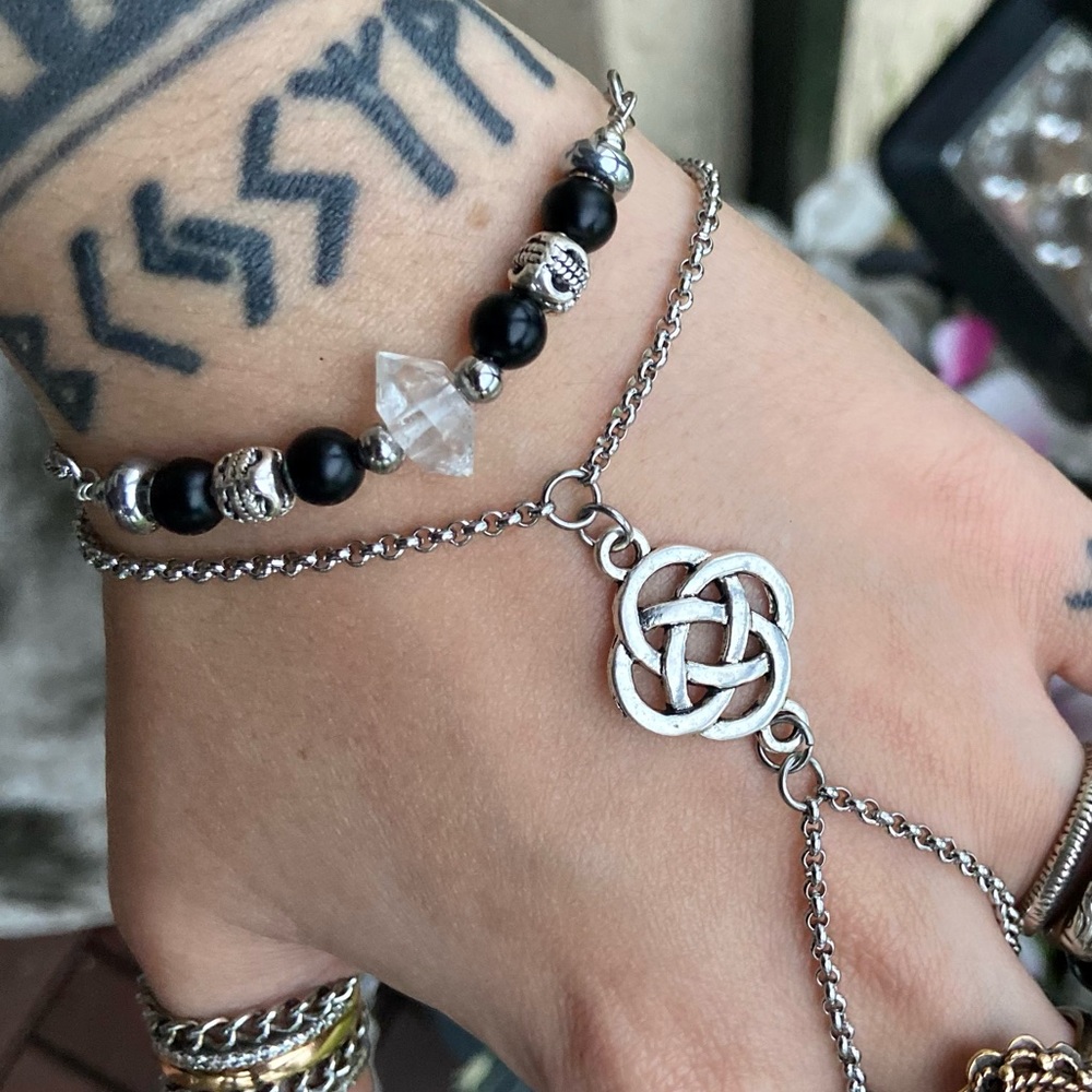 Crystal celtic bracelets . Herkimer diamonds quartz onyx beads celtic knot charm